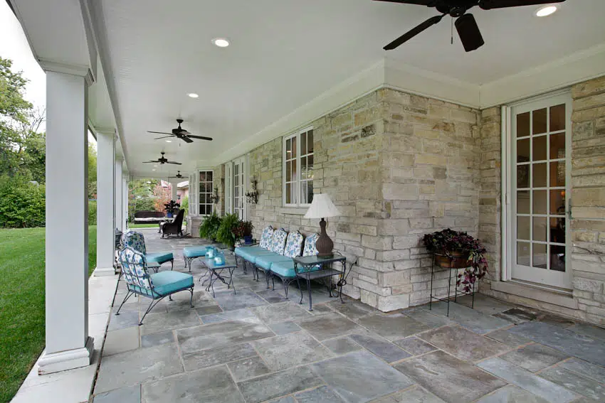 Patio with slate slabs and outdoor furniture