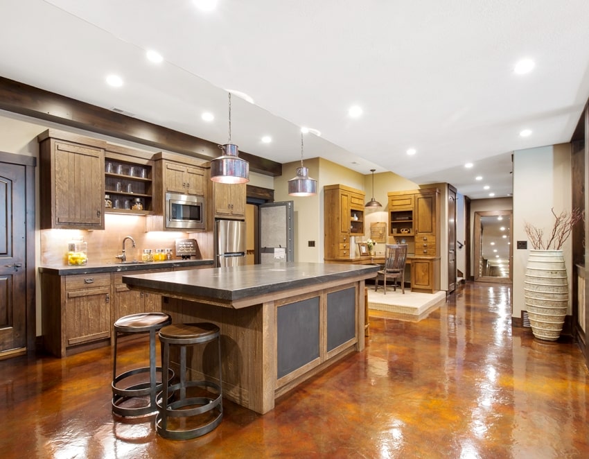 second kitchen with glossy epoxy basement flooring and large kitchen