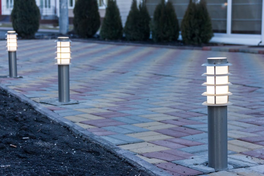 Solar lights illuminating the driveway