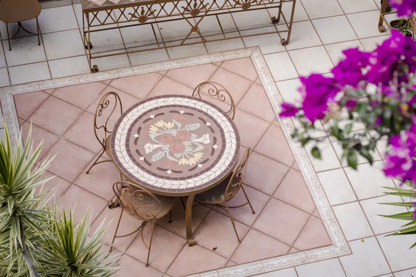 Spanish style patio with light pink ceramic tiles 