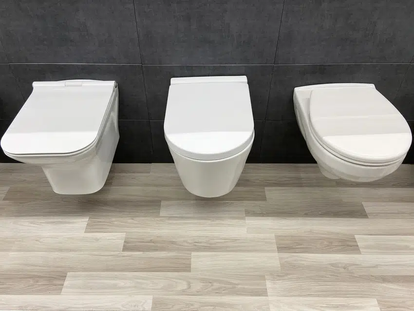 White tankless toilets in the showroom