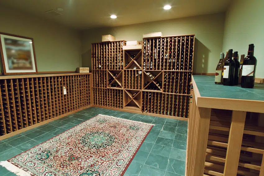 Wine storage room with various bottles of wine on display 