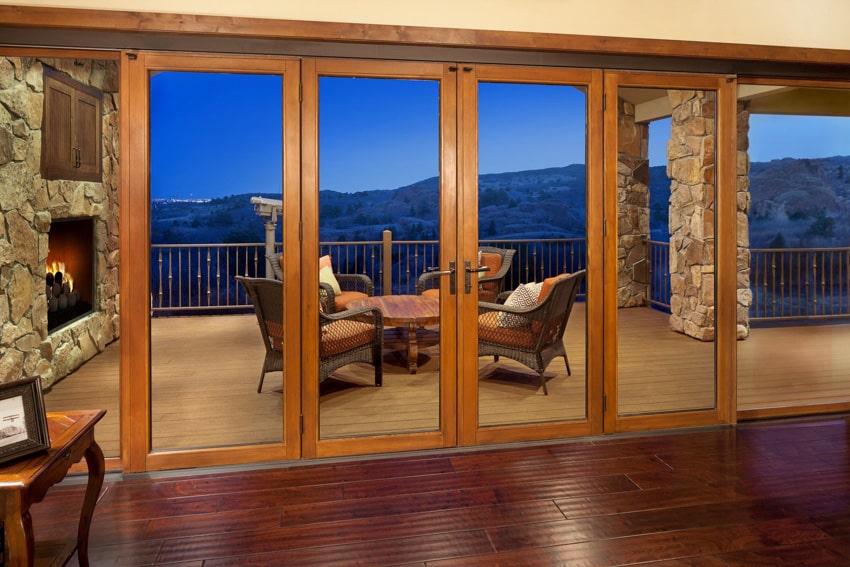 Wood door frame outdoor patio with center table and chairs