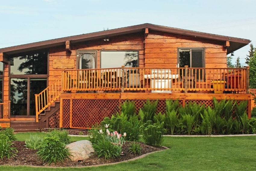 Wooden cottage with rough sawn siding