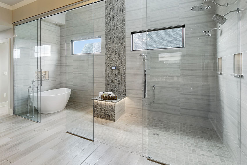 Bathroom shower with frameless shower doors free standing tub is