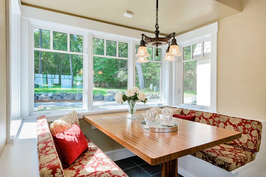 Breakfast nook with picture windows chandelier