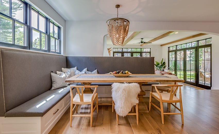 Breakfast nook with wood floor french doors chandelier