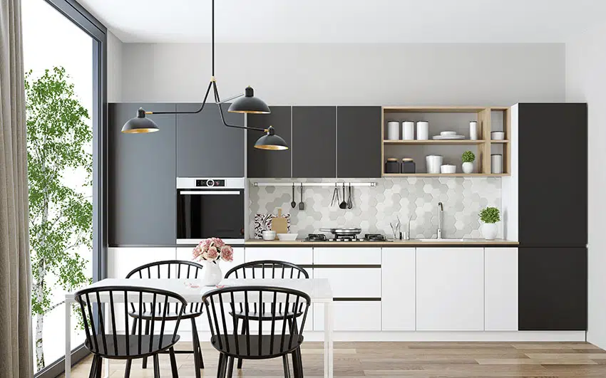 Kitchen and dining with black and white cabinets sputnik chandelier microwave