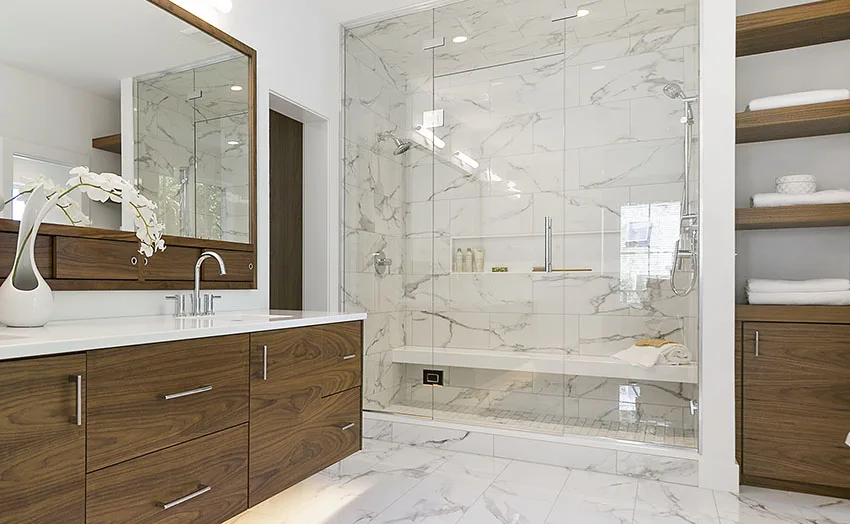 Walk in shower with white tiles frameless glass shower doors