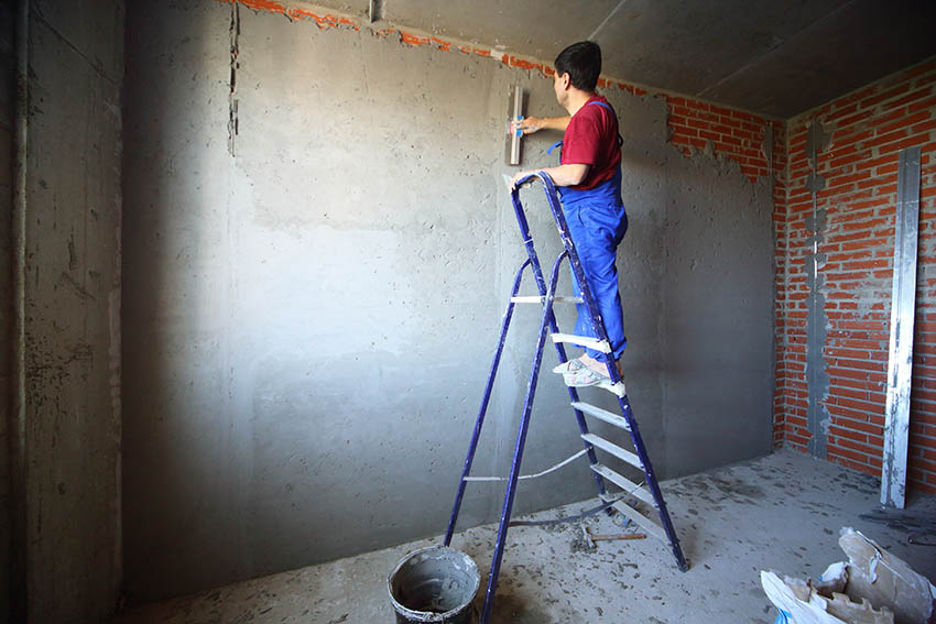 Adding stucco over brick walls