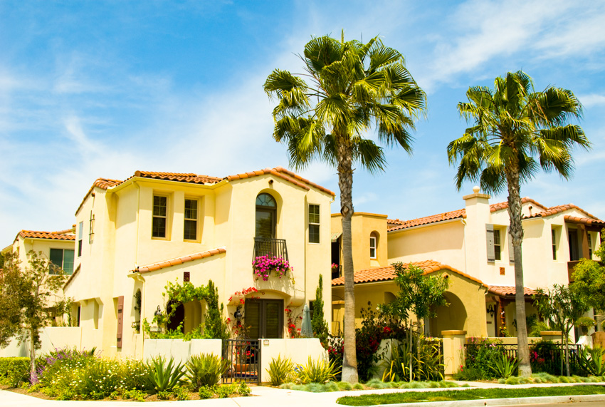 Big spanish style house palm trees