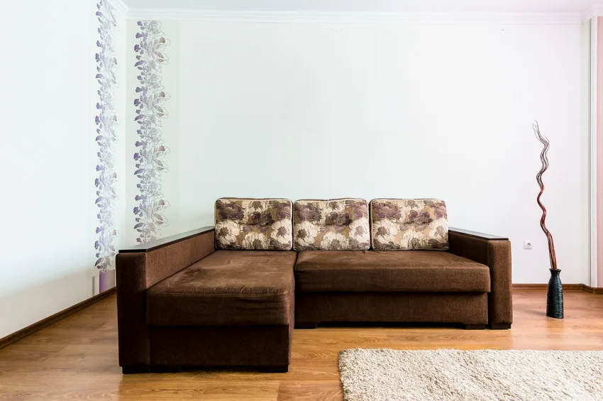 Brown L shaped sofa 
