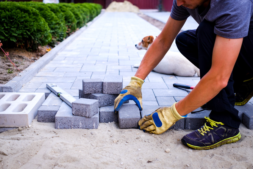 Contractor installing brick 