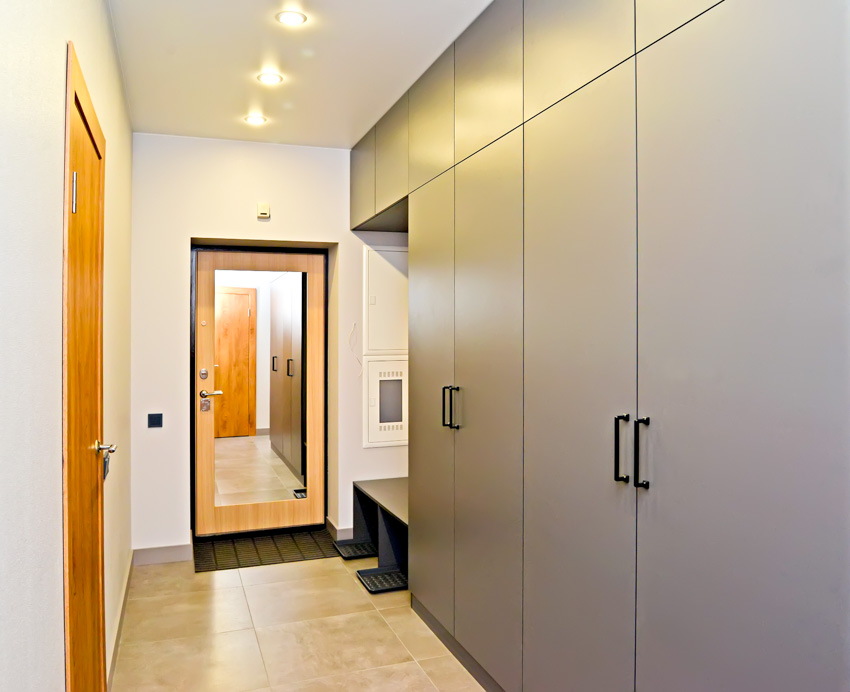 Mirror behind the door and corridor cabinets