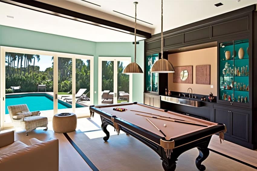Game room green paint with large built-in bar overlooking pool