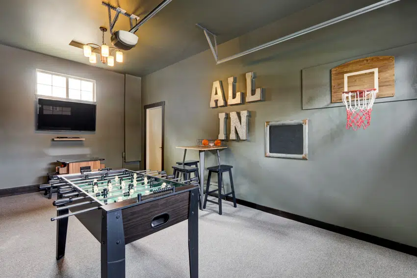 garage converted to game room football table TV