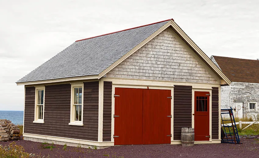 Garage with composite shingle roofing