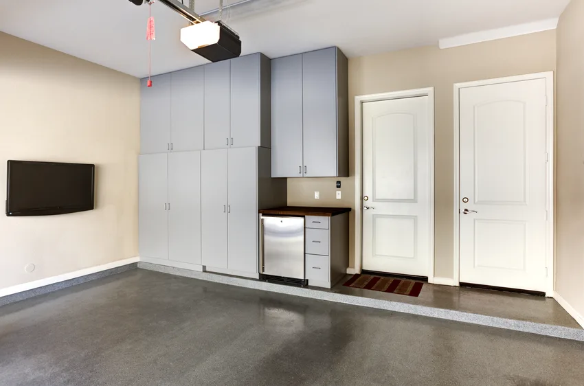 Garage with custom gray cabinets