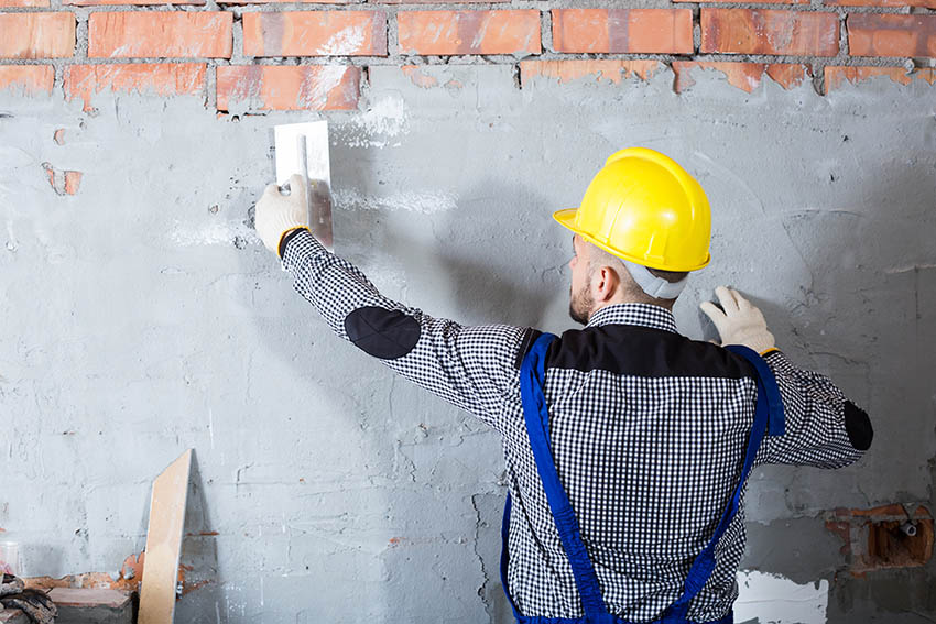 Installing stucco over brick wall