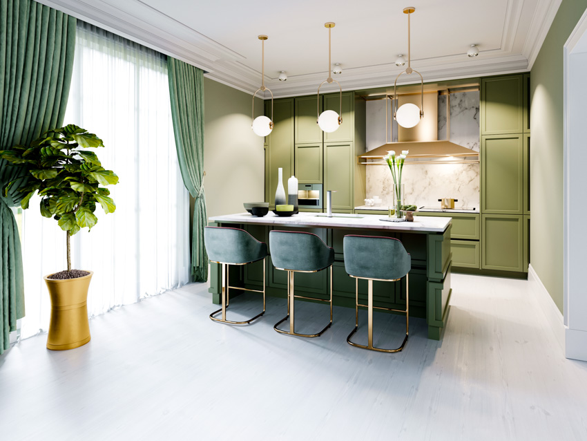 Kitchen and green dining area, cabinet, curtains, windows, and indoor plant