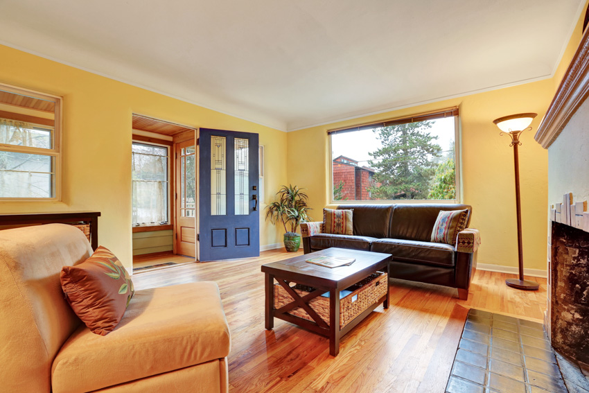 Living room with wood floor brown furniture