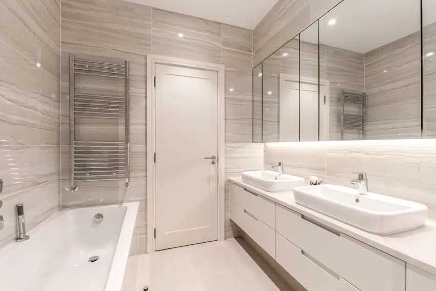 A modern tiled clean bathroom interior