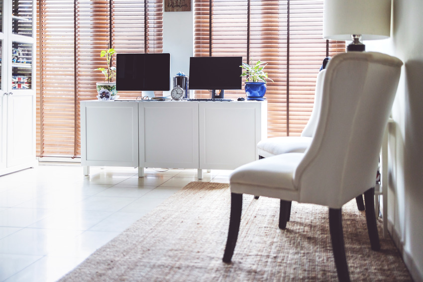 Modern home office with two desktop computers