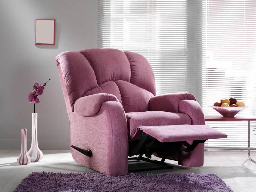 Purple recliner chair on living room rug