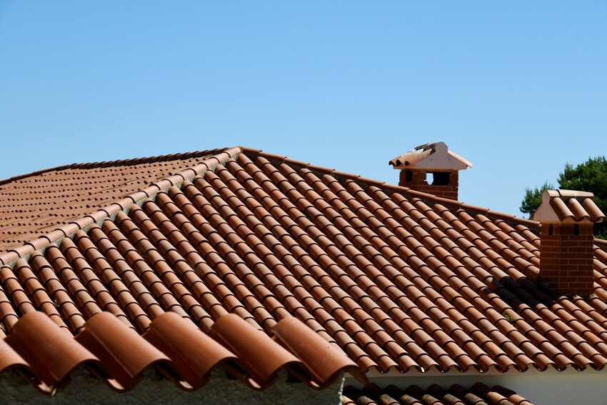 Roof tiles and chimneys on house