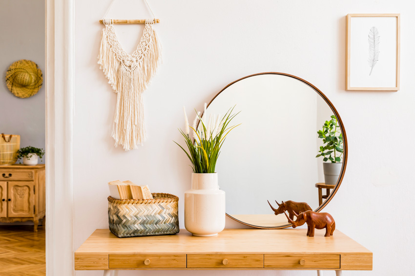 A disc-shaped mirror in an Asian-inspired space 