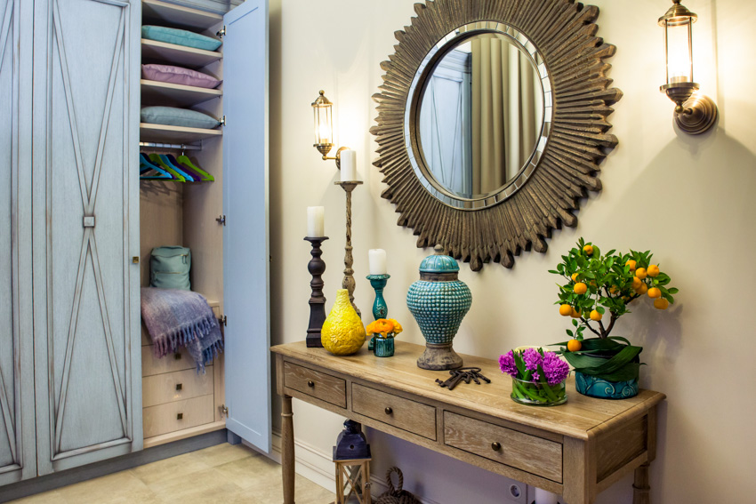 Ornately designed mirror and a console table 