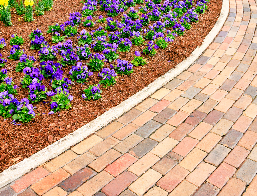 Running bond walkway brick edging flowers