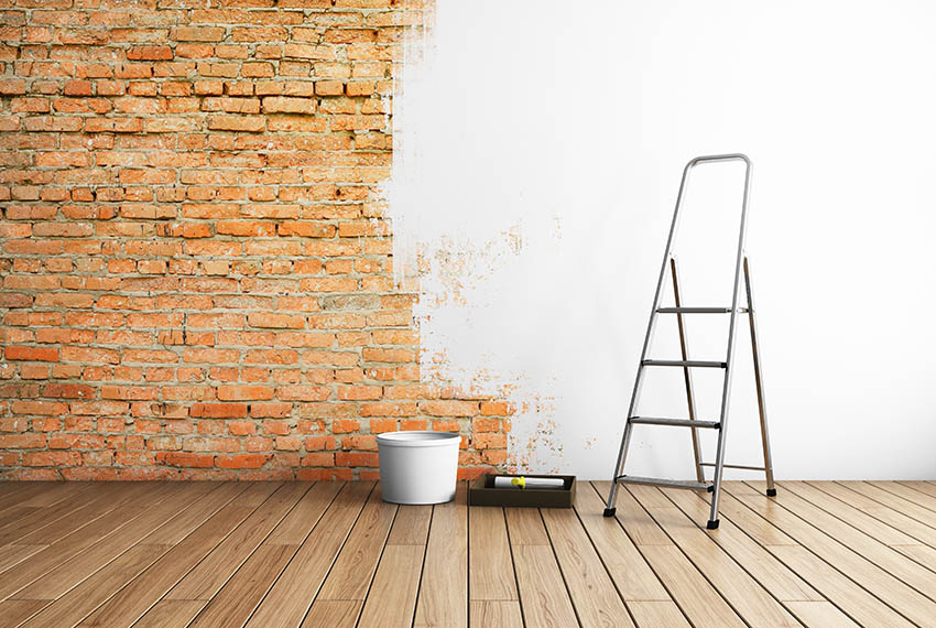 Stucco over brick interior