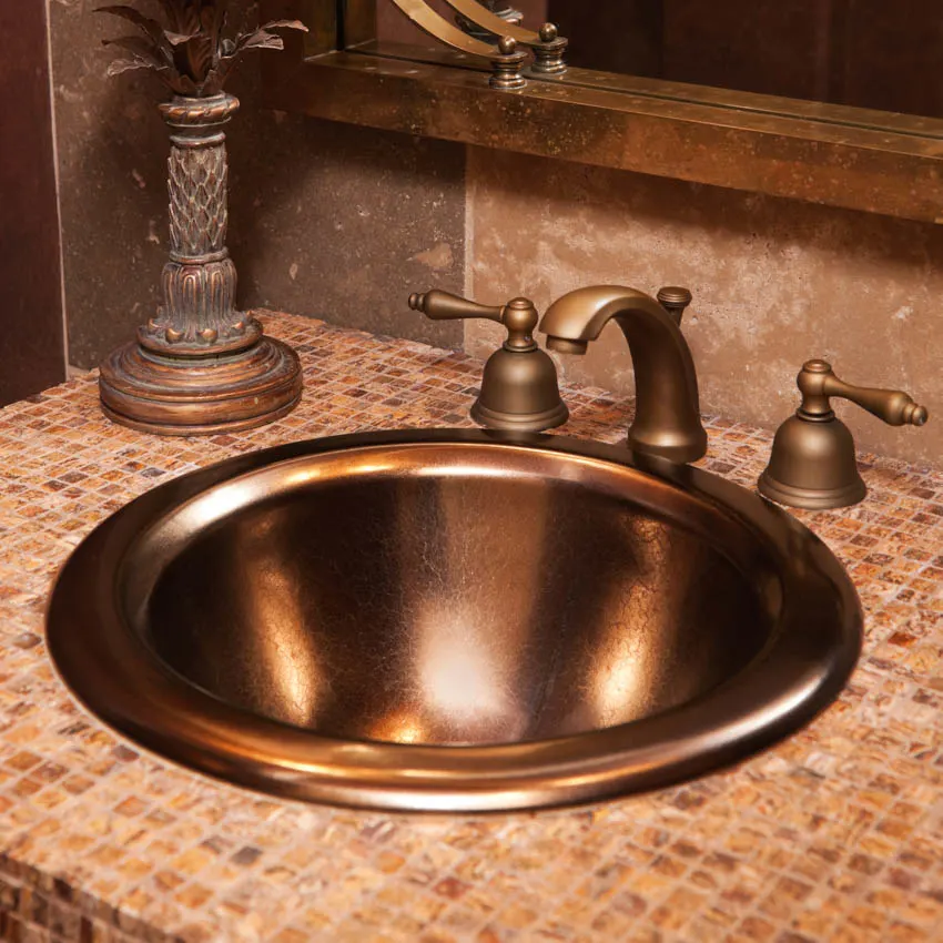 Tiled countertop with copper sink faucet