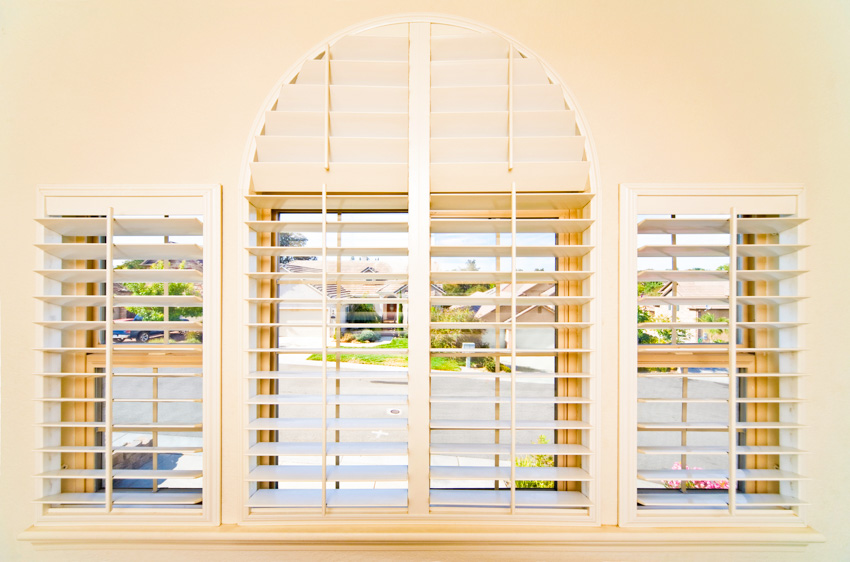 Traditional interior shutters window