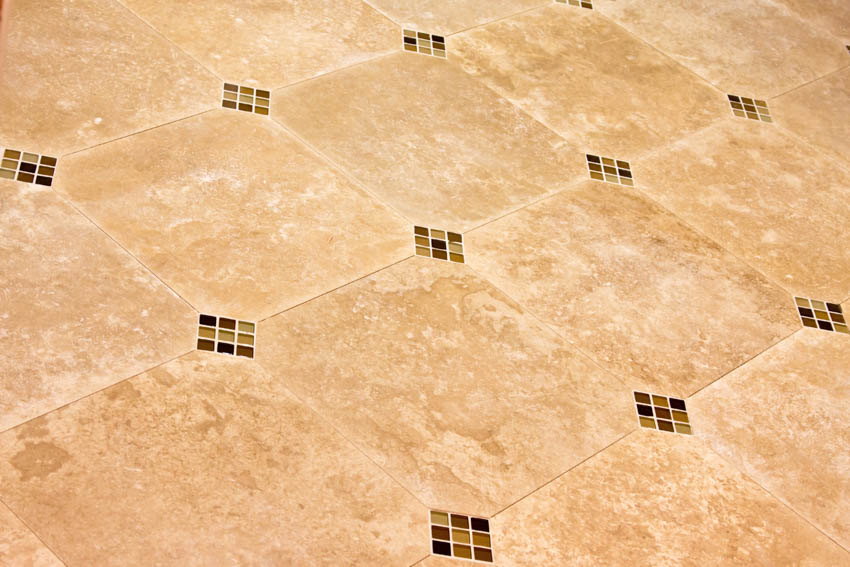 Travertine floor tiles with glass insertions