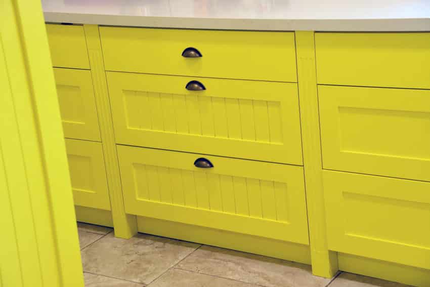 Vibrant yellow pantry storage drawers