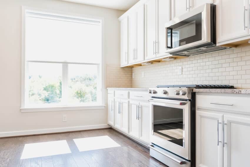 Single wall white kitchen interior