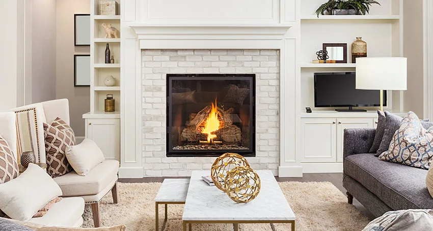 Insert wood fireplace with white surround
