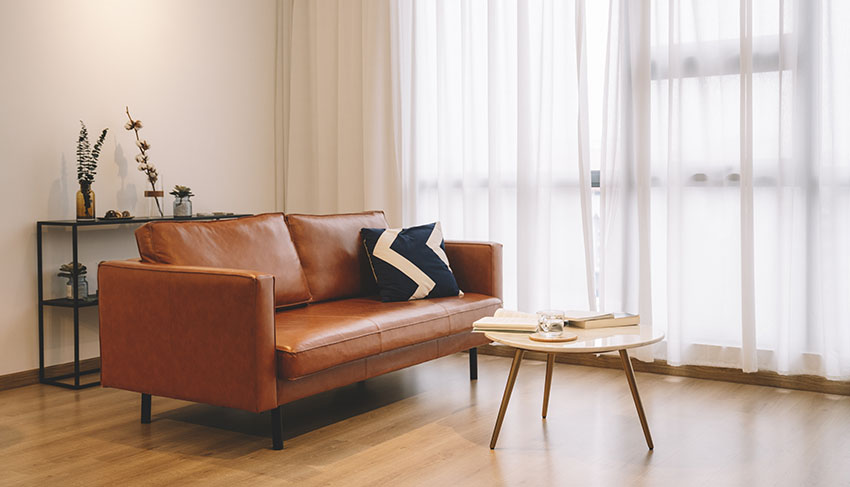 Leather seat sofa with coffee table