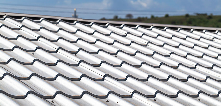 Acrylic roof coatings on metal roof