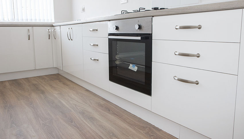 White cabinet with oven