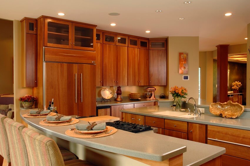 A new kitchen with contemporary design and cherry cabinets