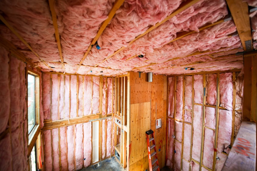 Attic with pink colored insulation