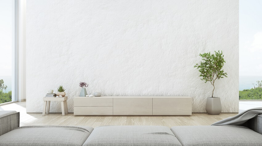 Beach house living room with tv stand wooden cabinet and spanish lace texture 