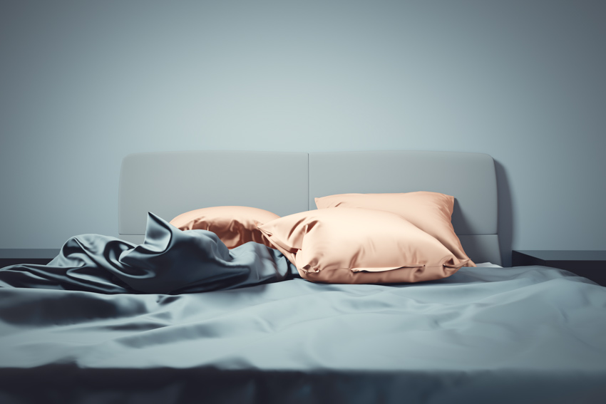 Bed with silk pillowcases