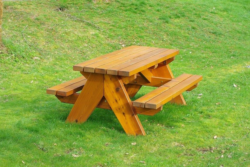 Bench table in a grassy lawn