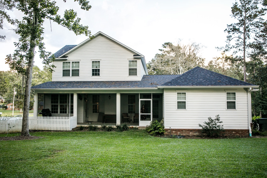 Classic house design with white siding front porch area