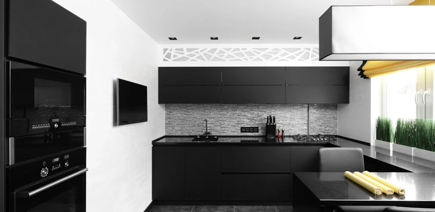 Contemporary kitchen black cabinet appliances hood recessed lighting
