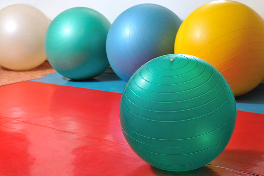Exercise balls on ground different colors